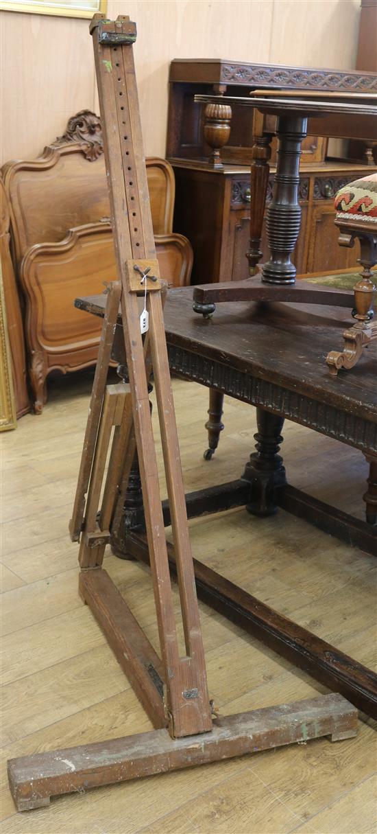 An Edwardian oak and pine easel Height 162cm